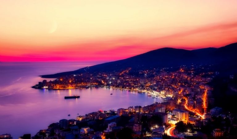 A scenic view of Albania's coastline and mountains.